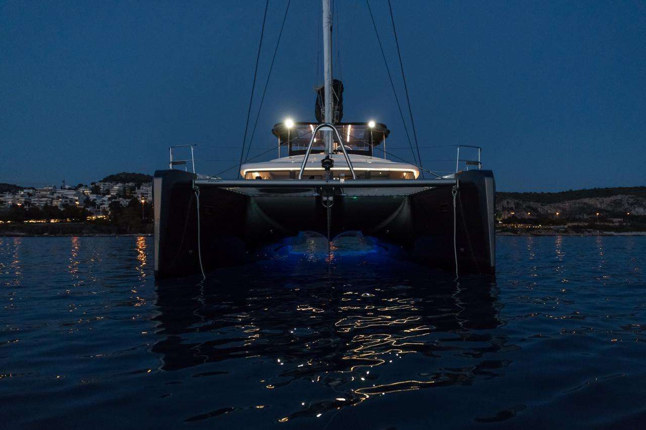 Nomad Crewed Lagoon 52 Catamaran Charter Anchored in Greece