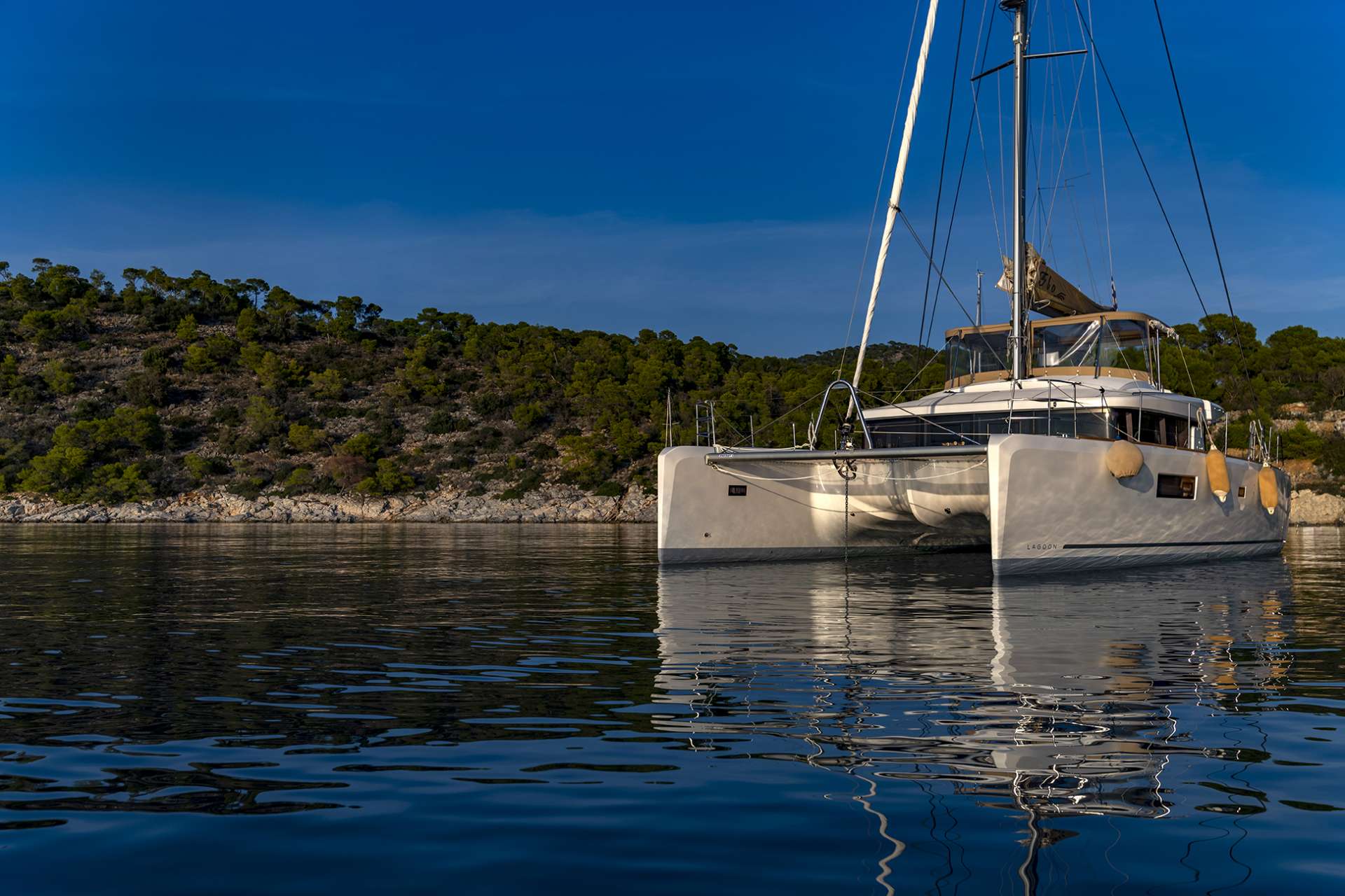 Flo Crewed Lagoon 52 Catamaran Charter Anchored in Greece