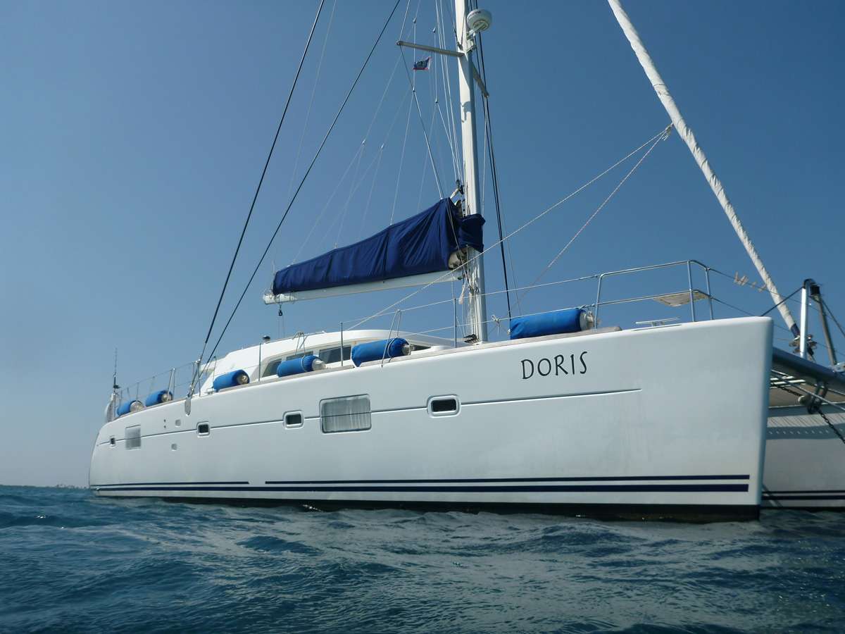 Doris Crewed Catamaran Charter Anchored in Belize