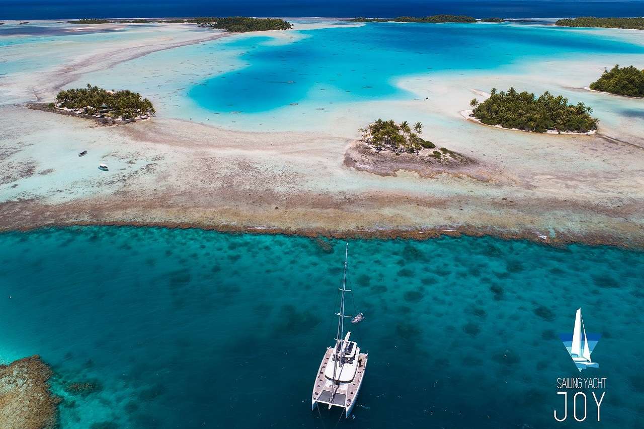 Joy Crewed Lagoon Seventy 7 Catamaran Charter Anchored in French Polynesia