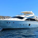 Questa e Vita crewed motoryacht charter at anchor in Greece