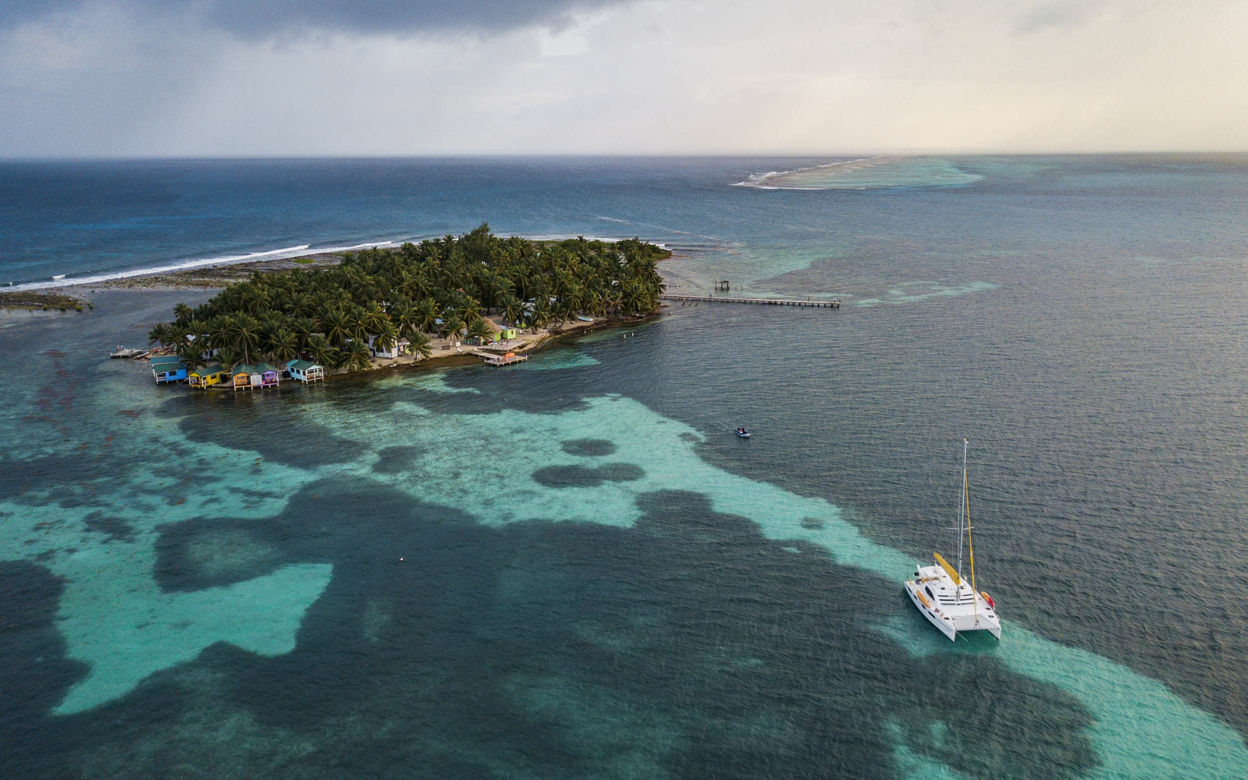 Sand Star Crewed Catamaran Charter Anchored at Belizean Cay
