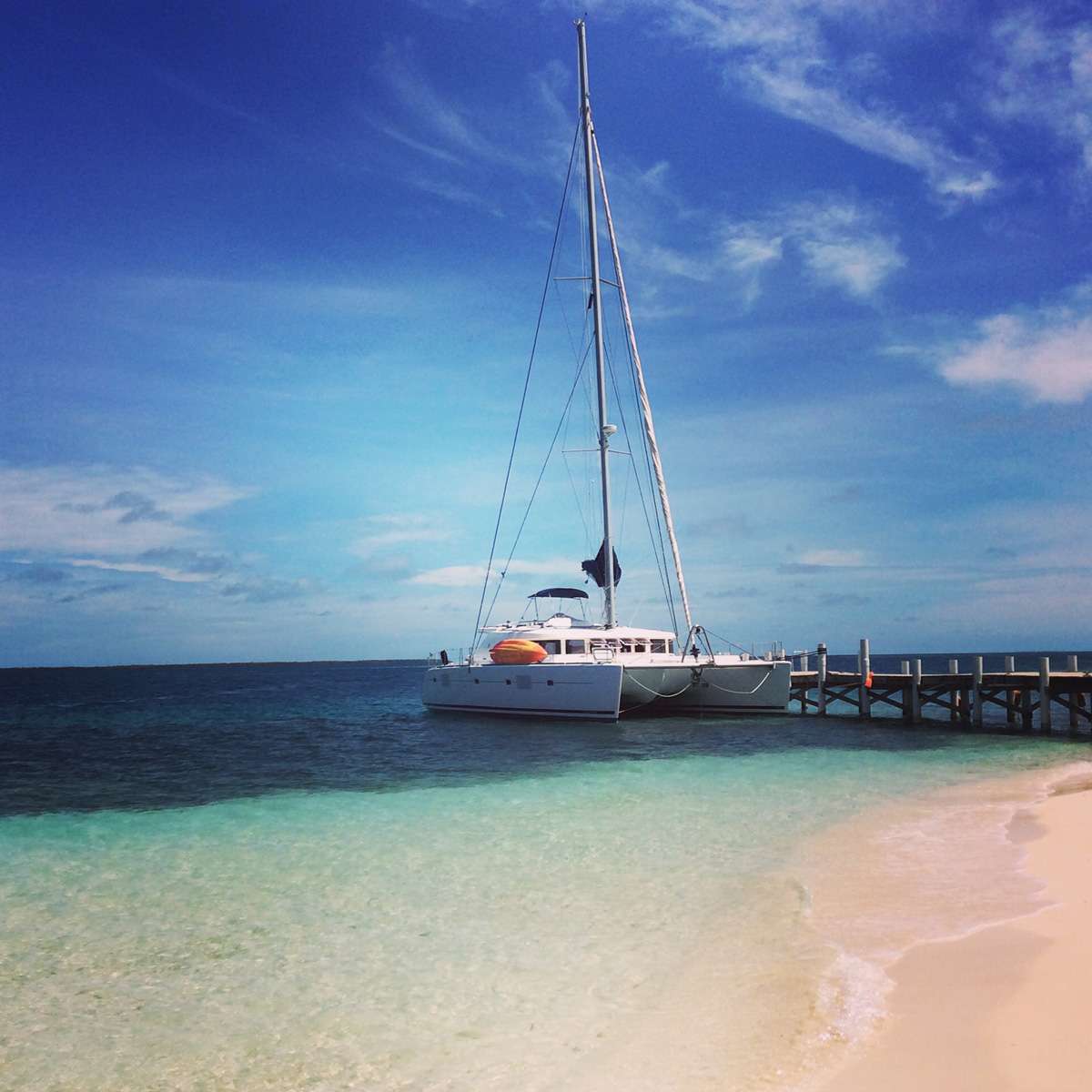 Sand Star Crewed Lagoon 500 Catamaran Charter Sailing in Belize