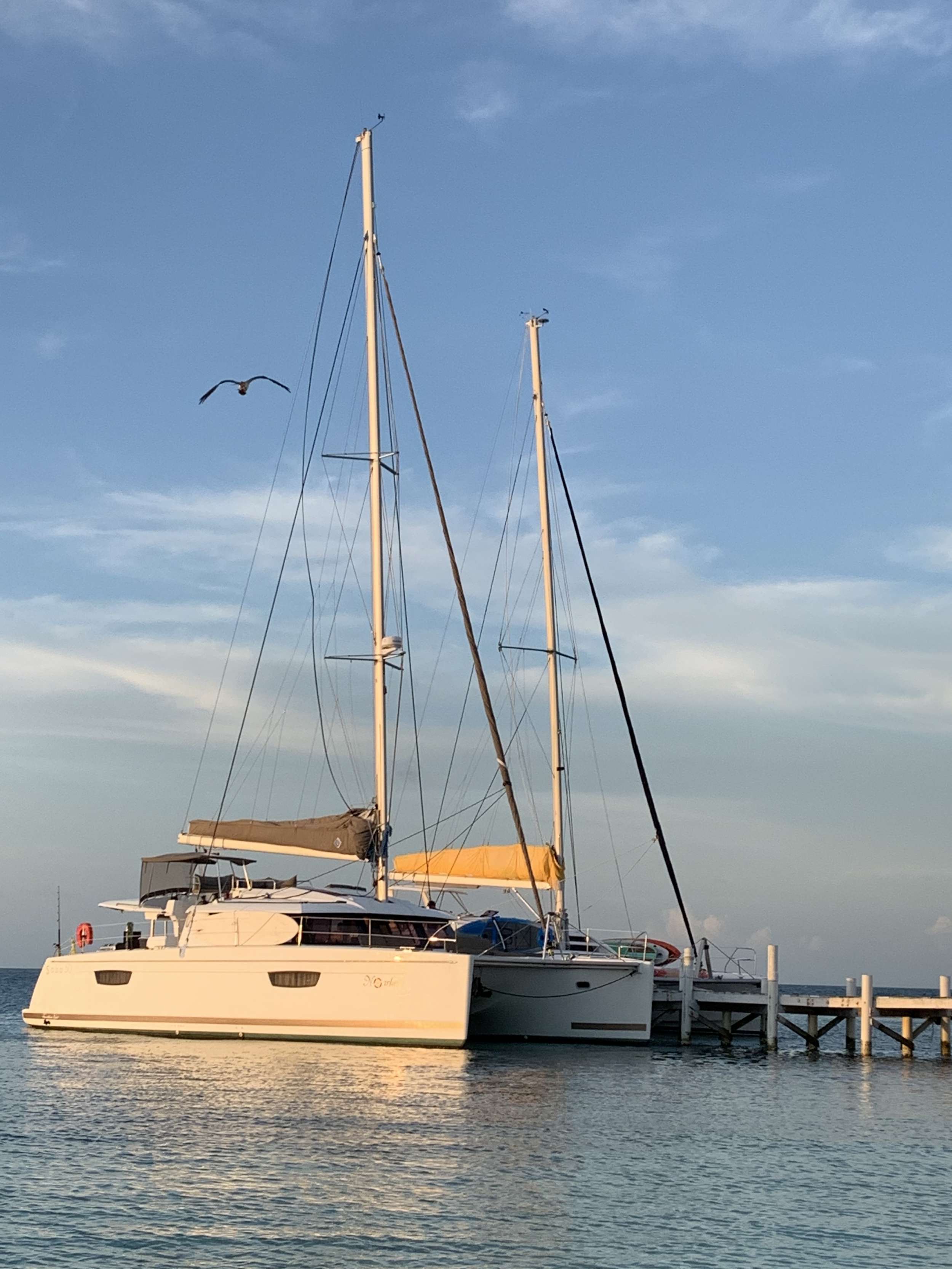 Nowhere Crewed Catamaran Charter Docked in Belize