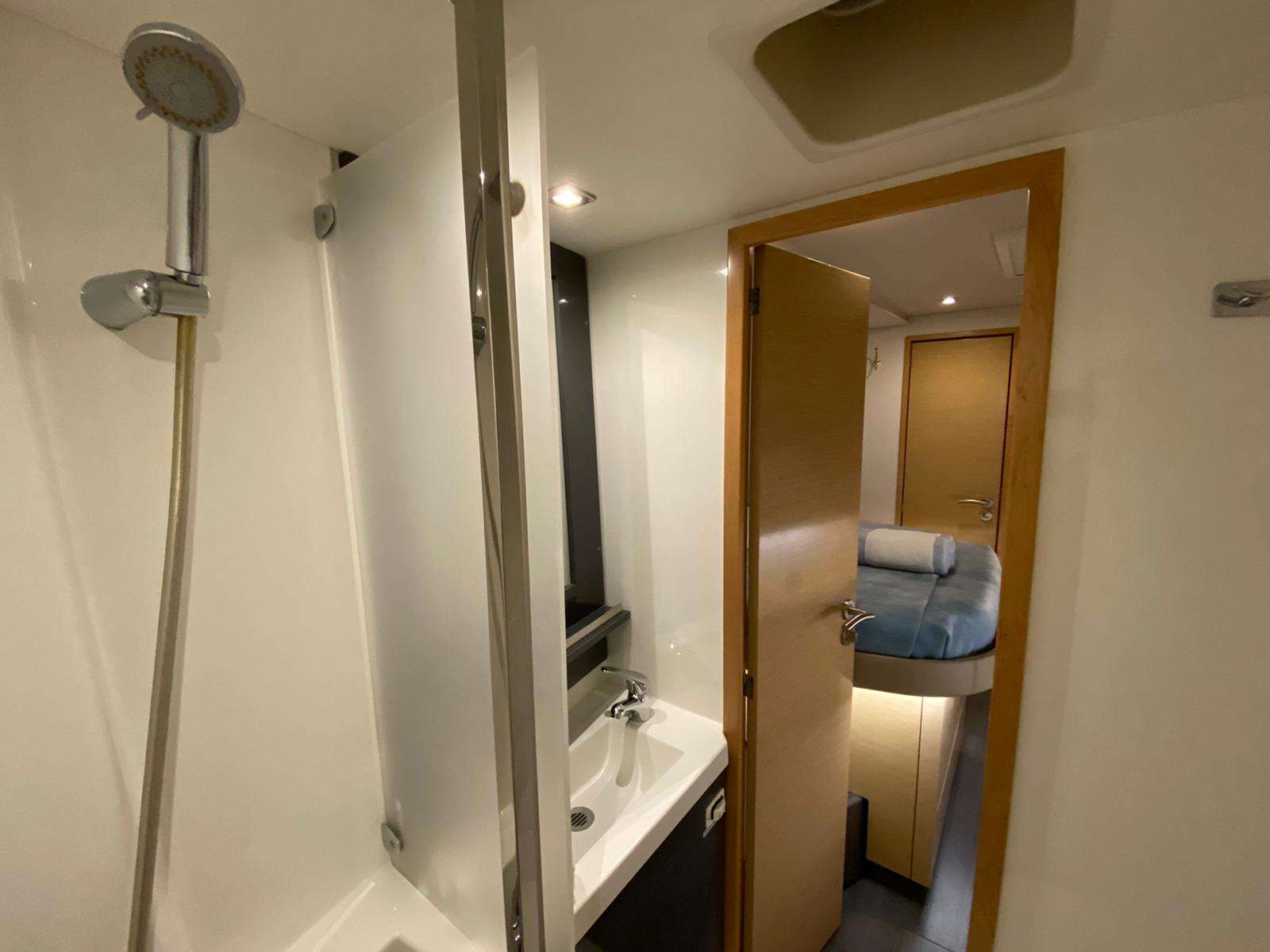 Nowhere Crewed Catamaran Charter En Suite Bath with Separate Shower