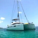 Freedom Crewed Catamaran Charter Anchored in the Grenadines