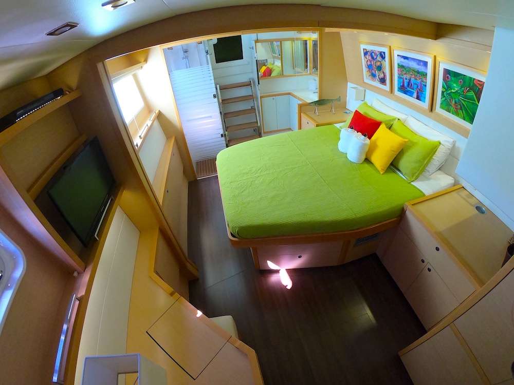 Copper Penny Crewed Catamaran Charters Master Cabin with Walkaround Queen Bed