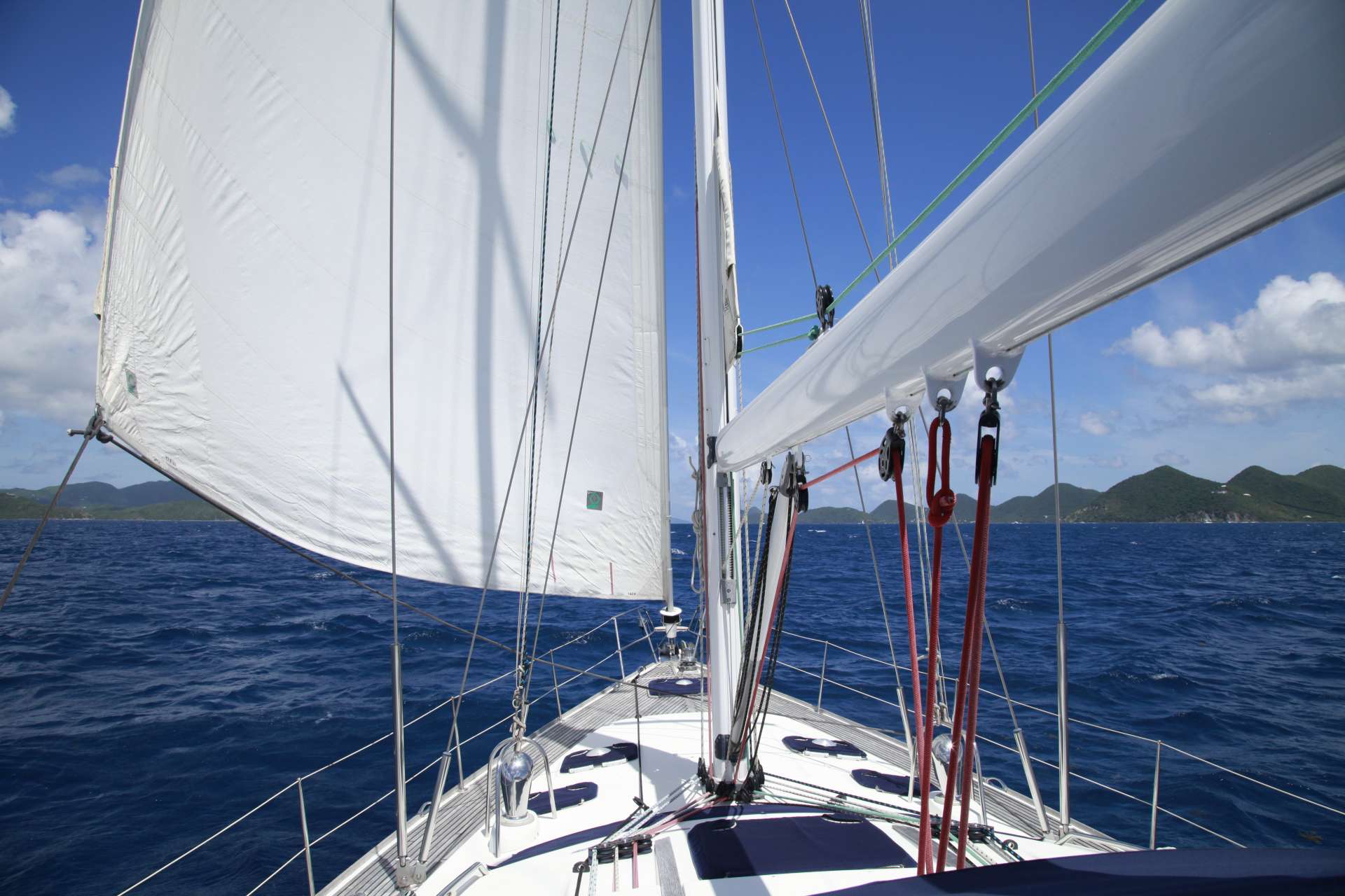 Sayang Crewed Yacht Charter Sailing Downwind in the BVI