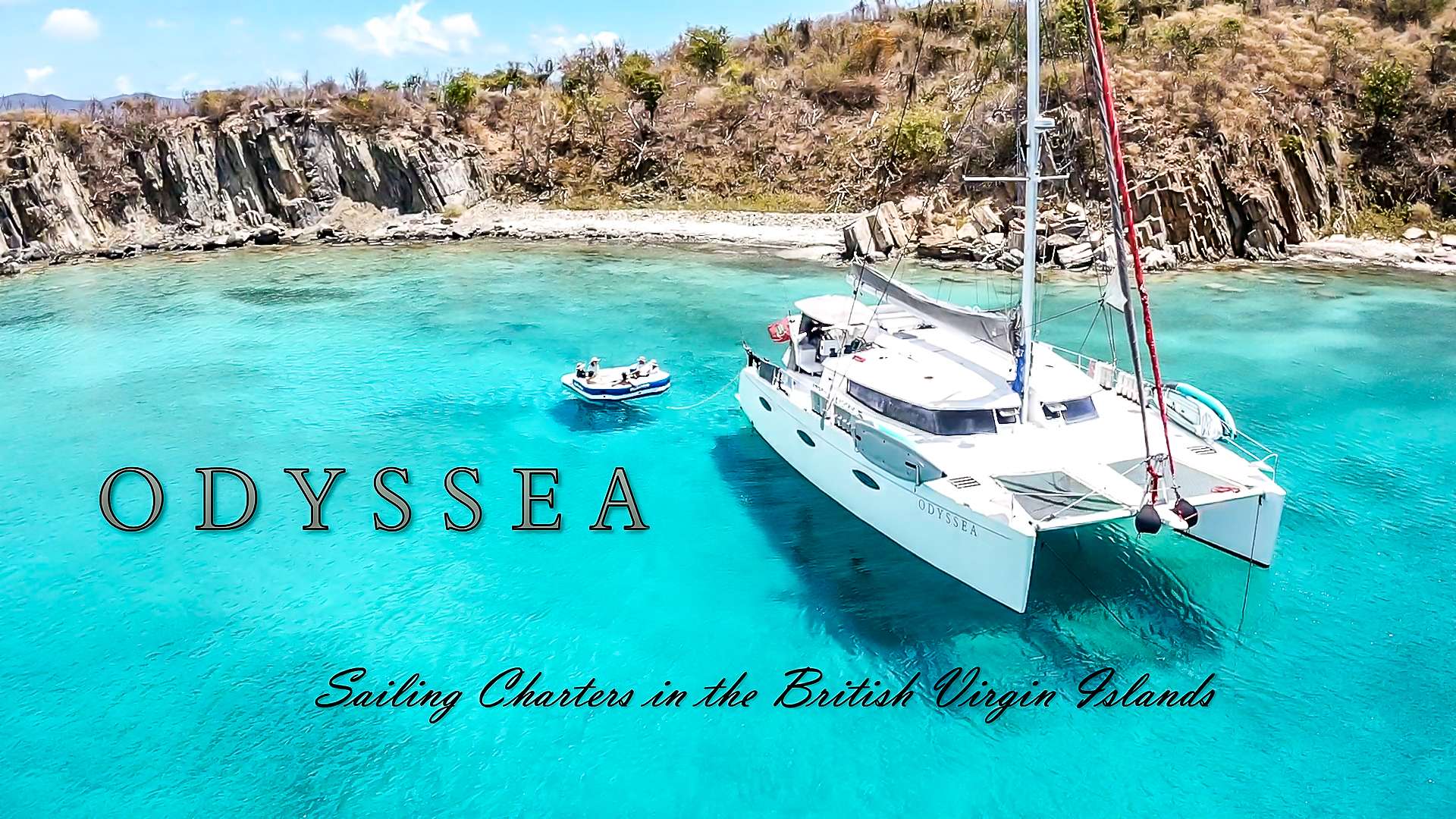 Odyssea Crewed Catamaran Charters Anchored in the BVI