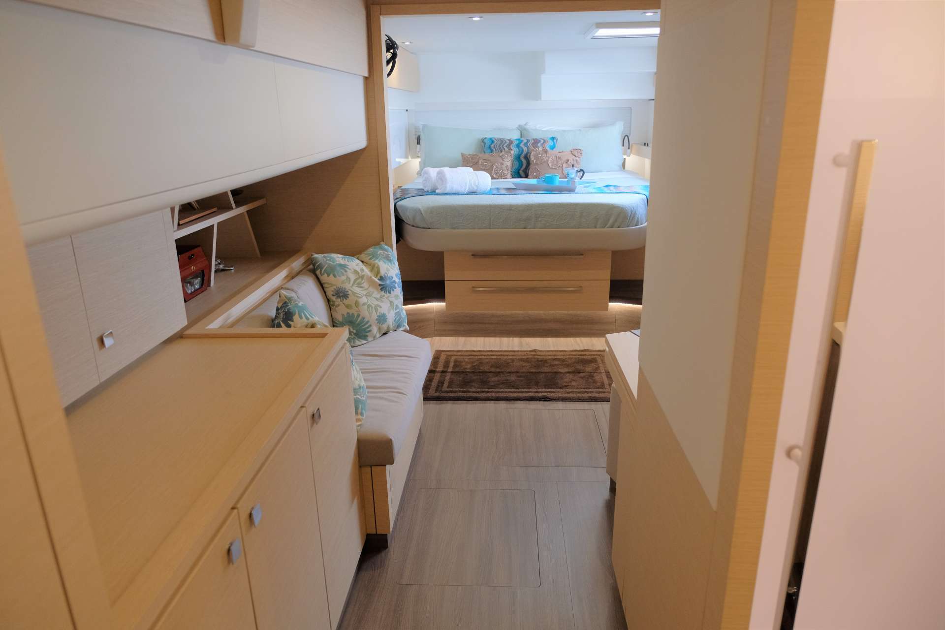 Port to Vino Crewed Catamaran Charters King Master Suite with Lounge Area