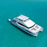 Seaglass Crewed Horizon 74 Powercat Charter Anchored in the Bahamas