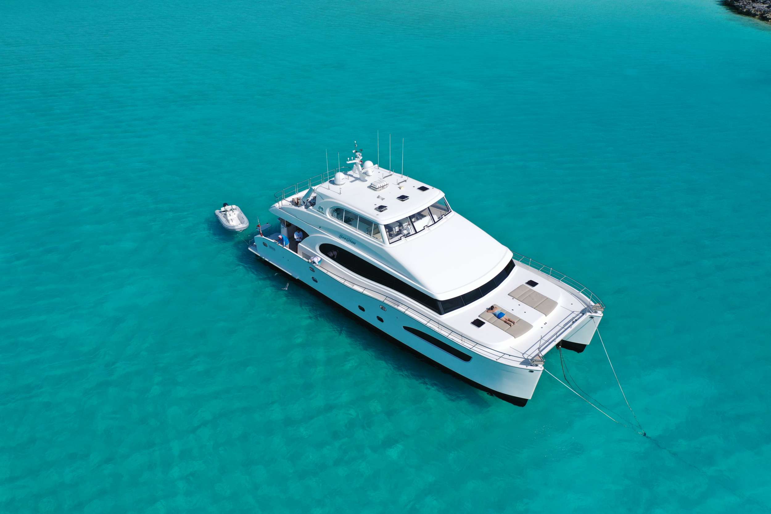 Seaglass Crewed Horizon 74 Powercat Charter Anchored in the Bahamas