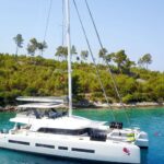 Adriatic Dragon crewed Lagoon 77 catamaran charter anchored in Croatia