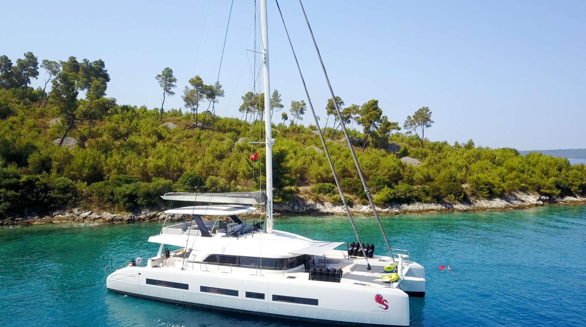 Adriatic Dragon crewed Lagoon 77 catamaran charter anchored in Croatia