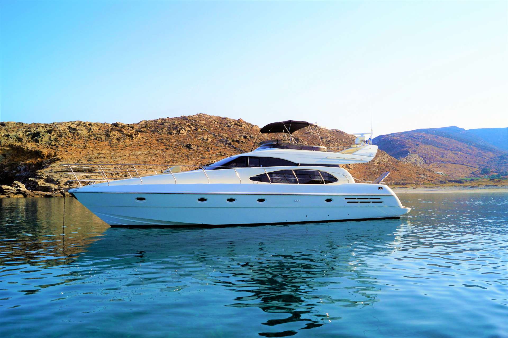 Aventura II Azimut 58 crewed motor yacht charter anchored in Greece