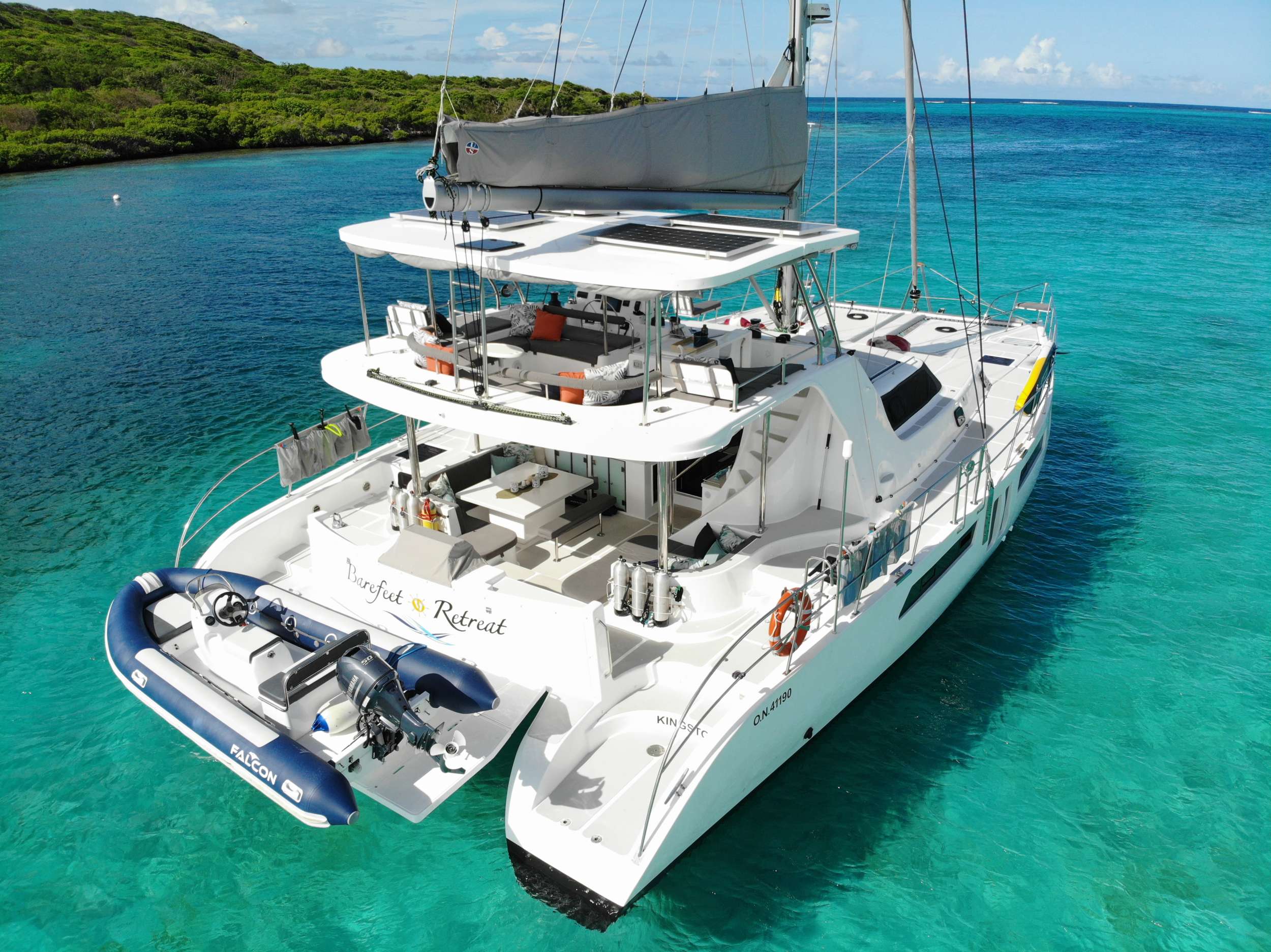 Barefeet Retreat Crewed Royal Cape 57 Catamaran Charters Sailing the BVI.