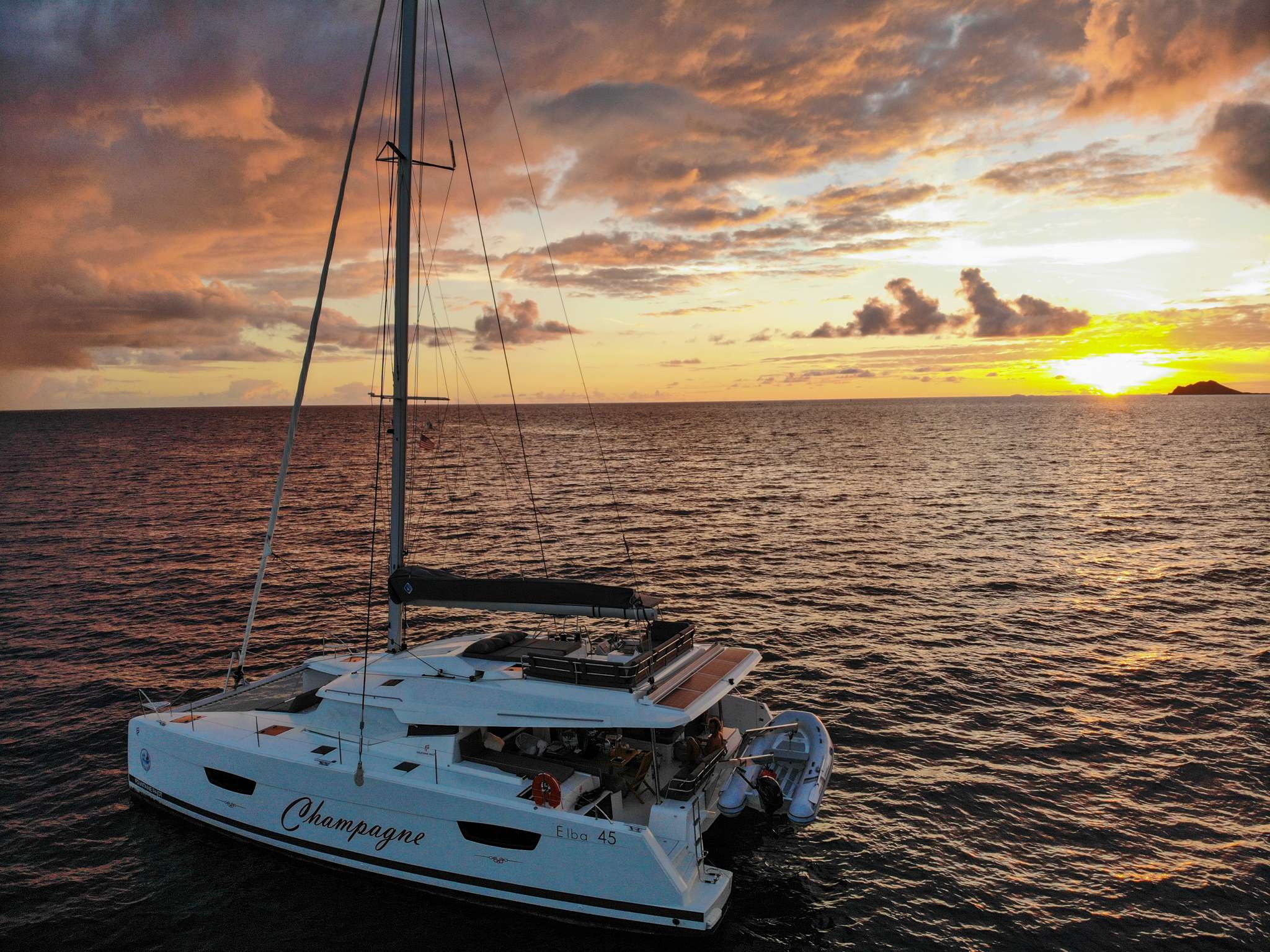 Champagne crewed Elba 45 catamaran charter anchored in the USVI