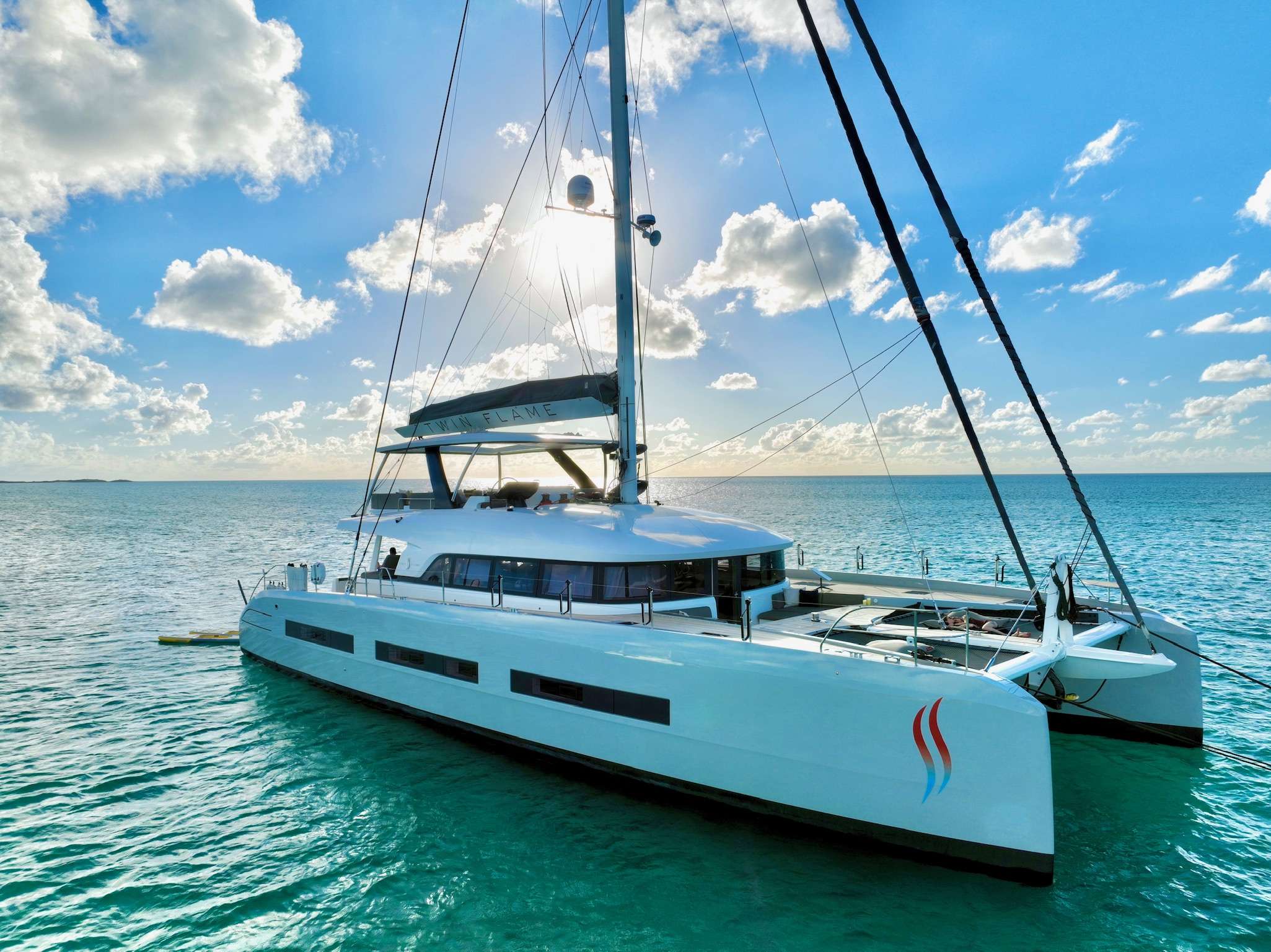 Twin Flame Crewed Lagoon Seventy 7 Catamaran Charters Anchored in the BVI