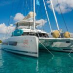 Namaste Crewed Samana 59 Catamaran Charter Anchored in Greece