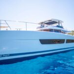 Alena Crewed Fountaine Pajot Power 67 Powercat Charter Anchored in Greece