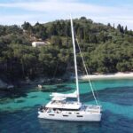 Grace Crewed Lagoon 62 Crewed Catamaran Charter Anchored in Greece