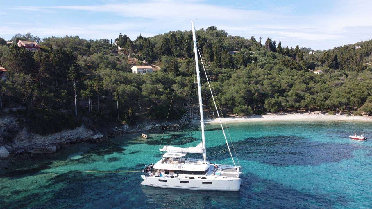 Grace Crewed Lagoon 62 Crewed Catamaran Charter Anchored in Greece