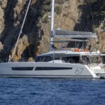 Aphaea Crewed Alegria 67 Catamaran Charter Anchored in Greece
