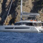 Dolly Crewed Fountaine Pajot Alegria 67 Catamaran Charter Sailing in Greece