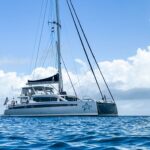 Seven Crewed Voyage 590 Catamaran Charters for 10 guests Sailing the BVI.