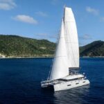 Dragonfly Crewed Lagoon 62 Catamaran Charter for up to 8 guests Sailing the BVI.