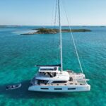 Aura Crewed Lagoon 65 Catamaran Charter Sailing the BVI.