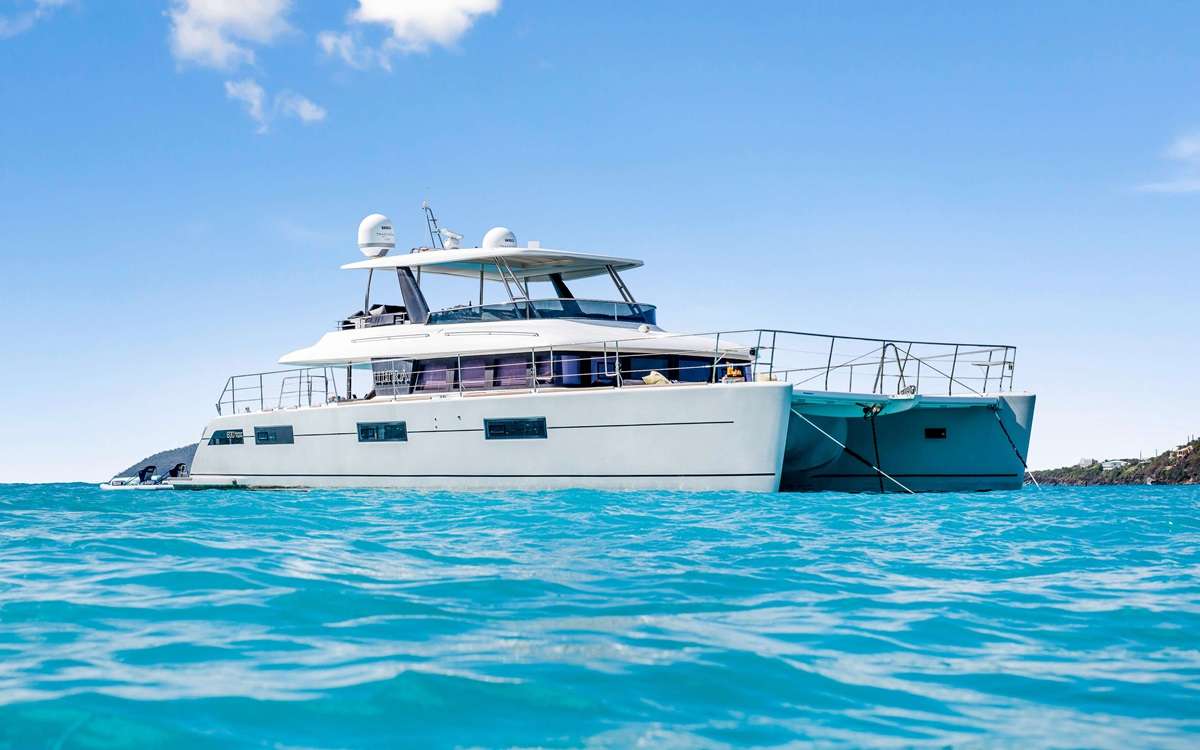 Ultra Crewed Lagoon 630 Powercat Charters Cruising the Virgin Islands.