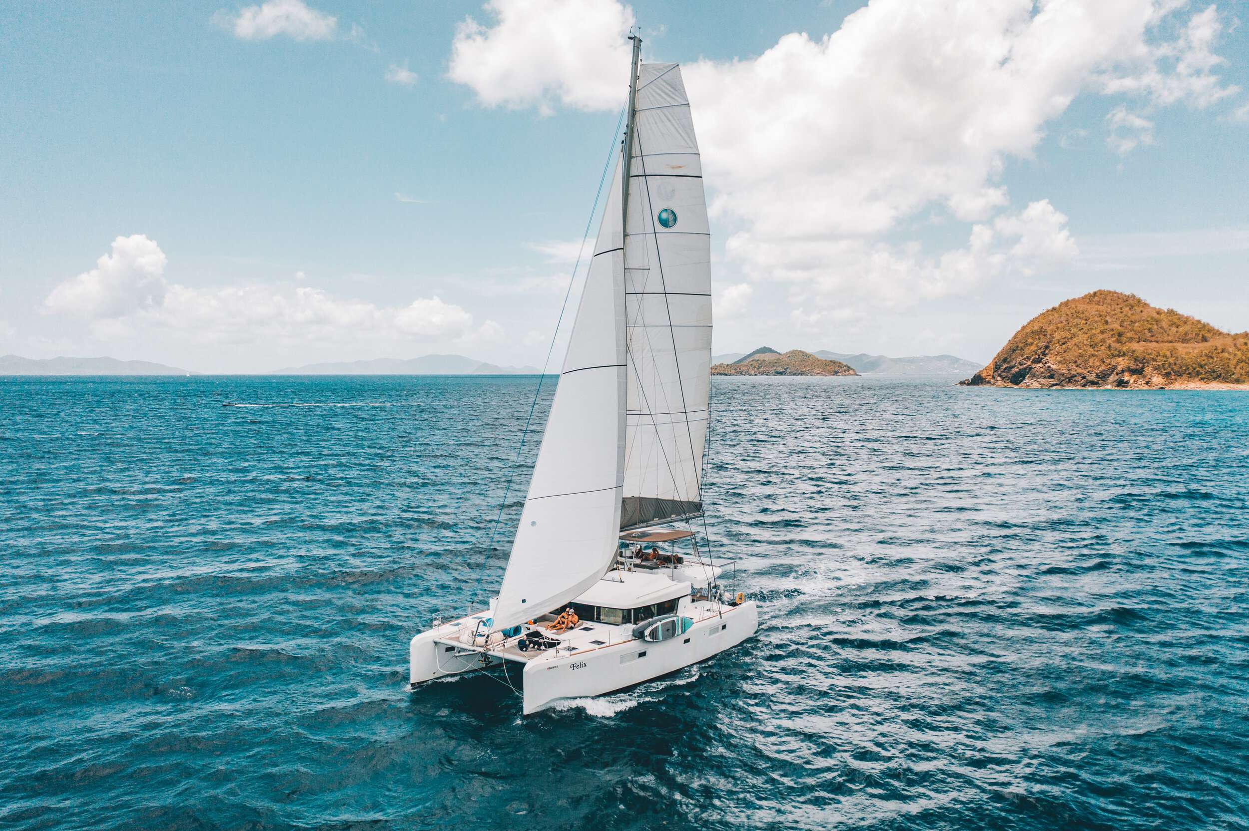 Felix Crewed Lagoon 52 Catamaran Charters Sailing the Virgin Islands.