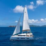 Pura Vida Crewed Dufour 48 Catamaran Charters Sailing the BVI.