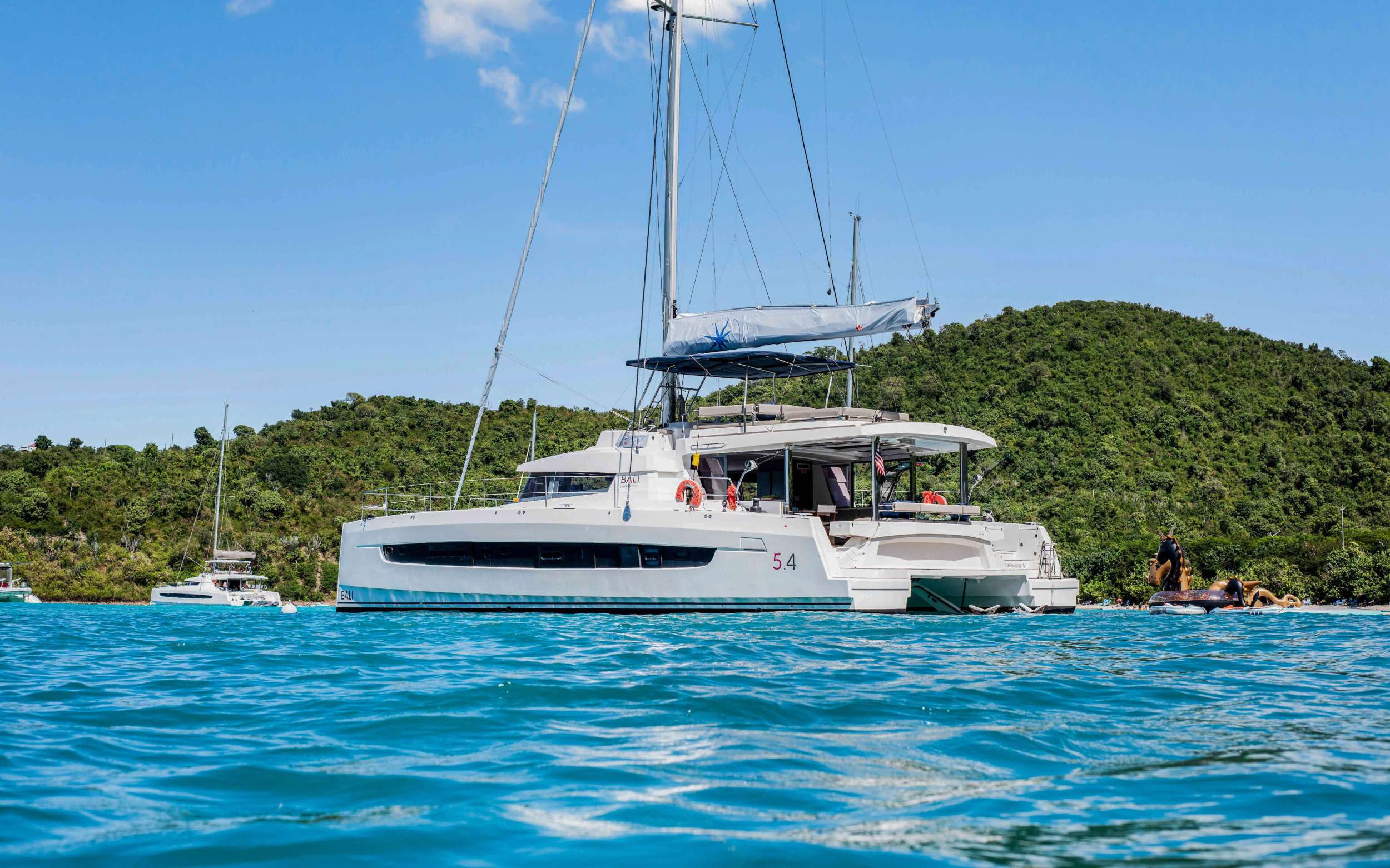 Permabear Crewed Bali 5.4 Catamaran Charters for 10 guests Sailing the BVI