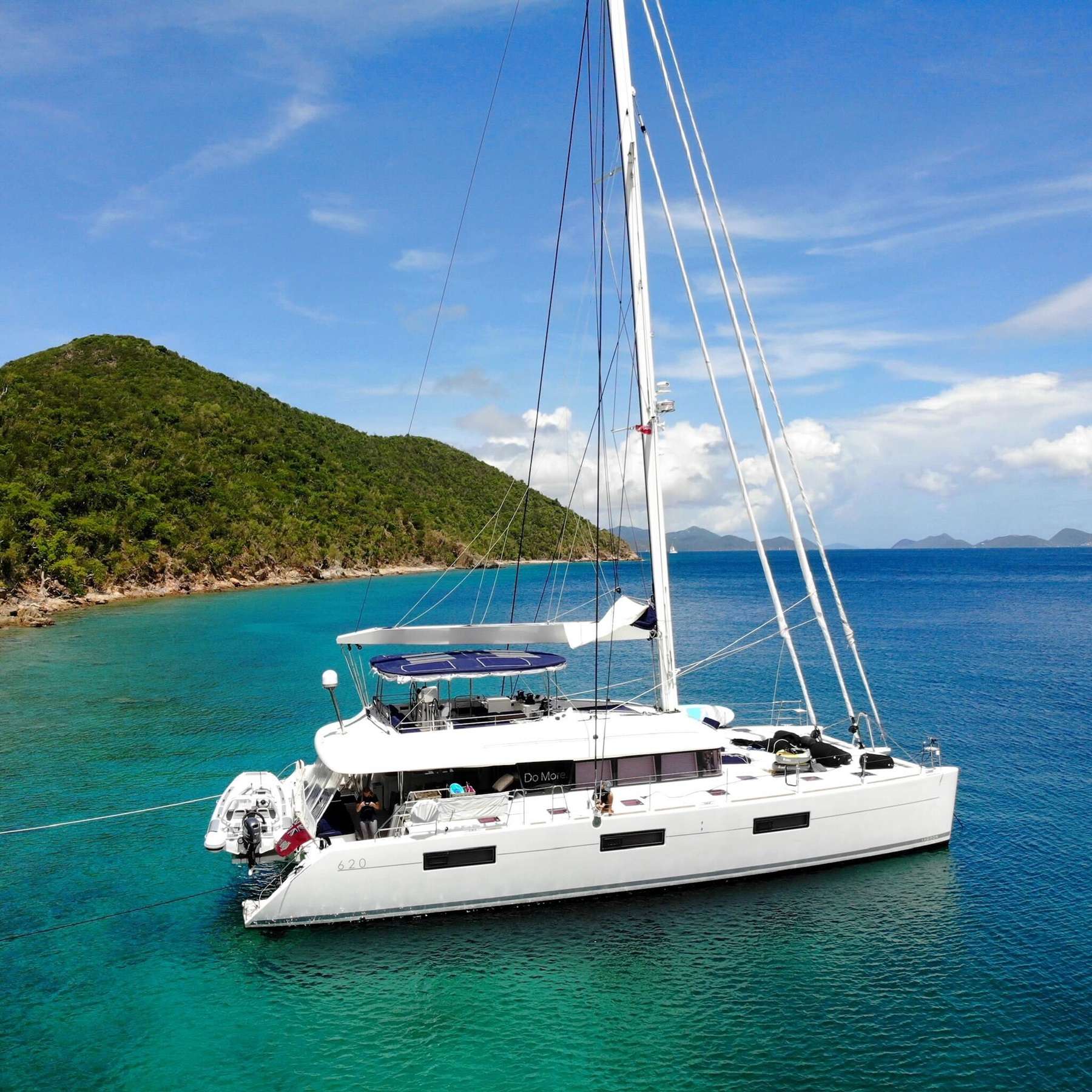 Do More Crewed Lagoon 620 Catamaran Charters Sailing the BVI for up to 10 guests.