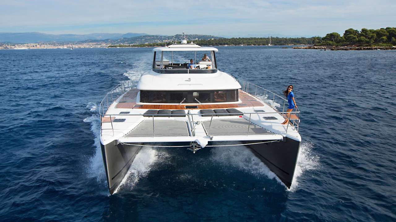 Jan's FeLion Crewed Lagoon 630 Powercat Charters Cruising the BVI.