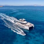 ChrisTAL MiO Crewed Fountaine Pajot Power 67 Powercat Charter Cruising Greece.