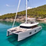 Above & Beyond Crewed Sunreef 80 Catamaran Charter Sailing Greece.