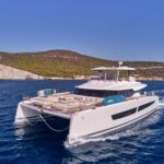 Elly Crewed Fountaine Pajot Power 67 Powercat Charter Cruising Greece.