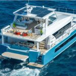 Earnout Crewed Two Oceans 555 Powercat Charter Cruising the BVI and Bahamas