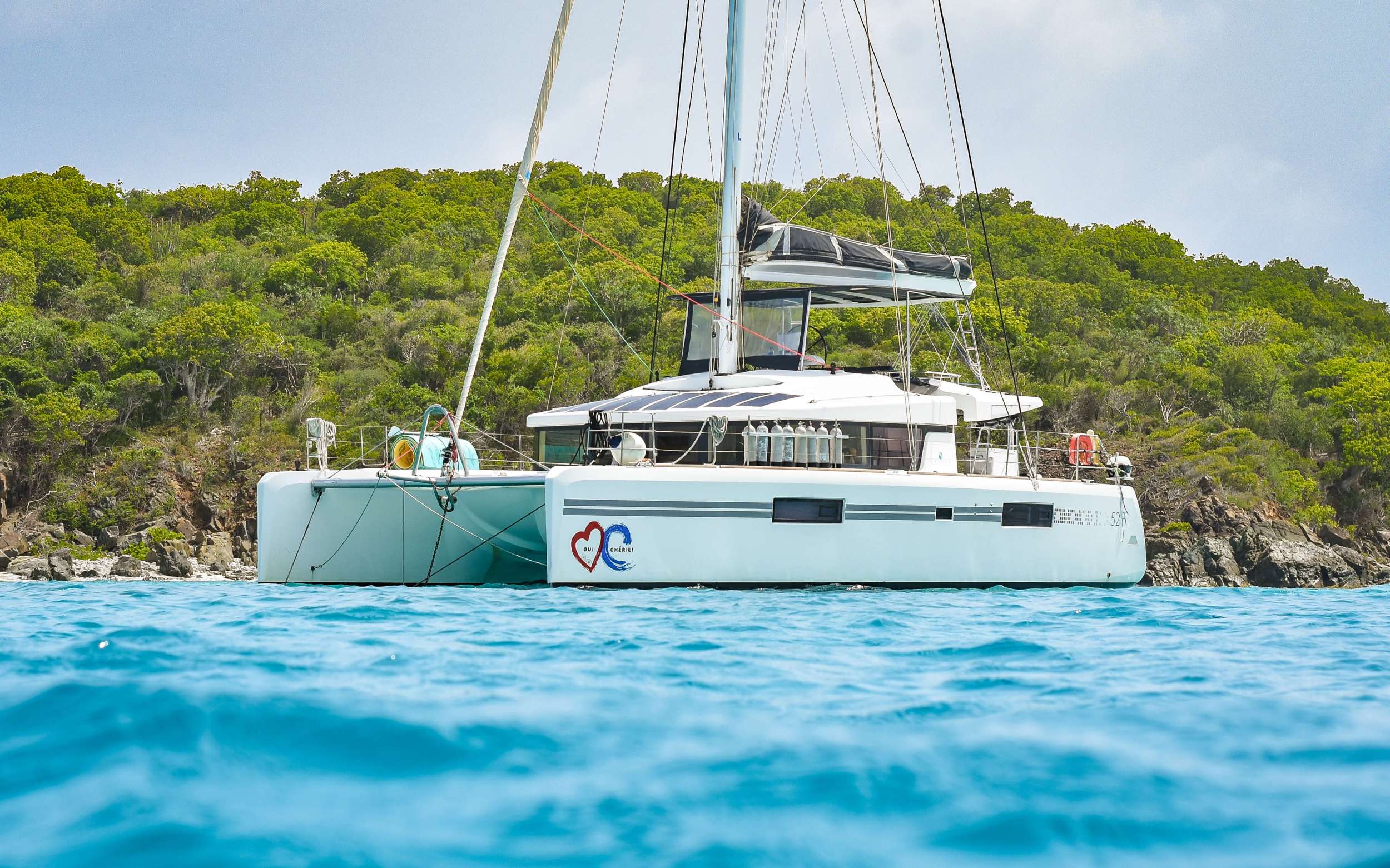 Oui Cherie Crewed Lagoon 52 Catamaran Charter Sailing the BVI.