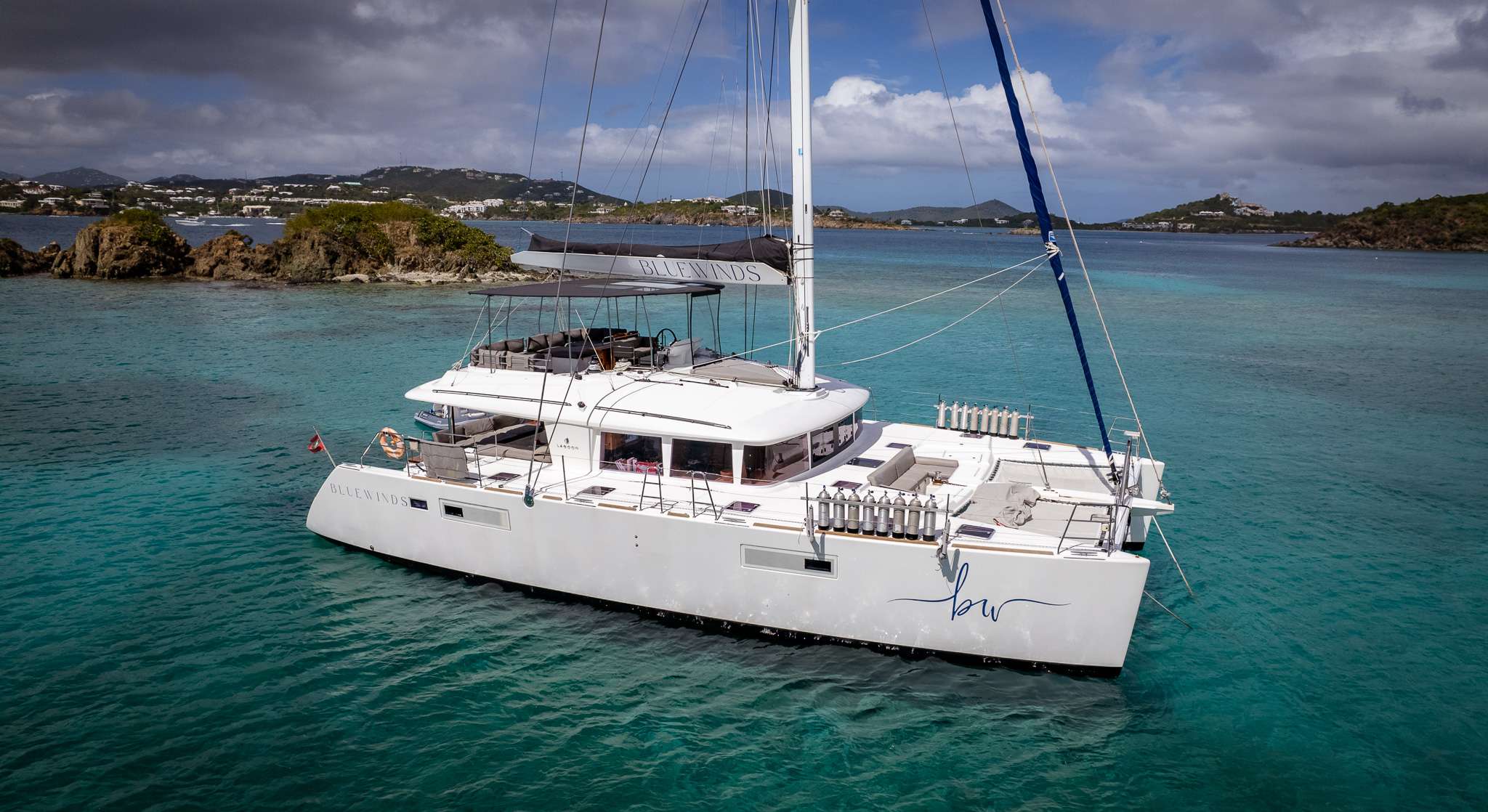 Bluewinds Crewed Lagoon 560 Catamaran Charters Sailing the BVI.