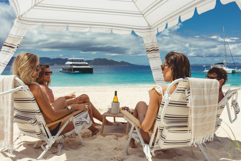 SOL Crewed Power Catamaran Beach Lounge