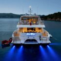 Luxury Crewed Power Catamaran Seaglass 74 Stern at night