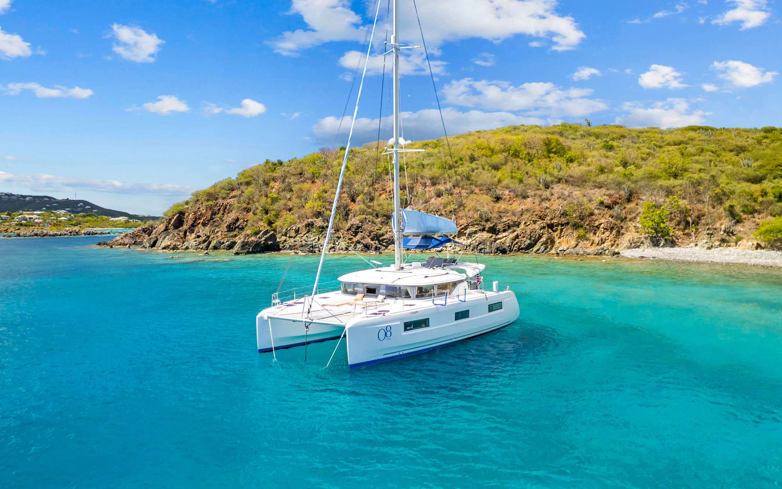 Oceans 8 Crewed Lagoon 46 Catamaran Charter Sailing the BVI.