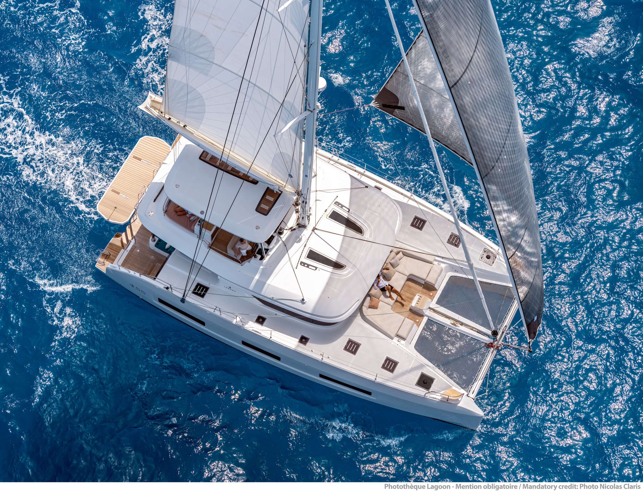 Seven Seas Crewed Lagooon 55 Catamaran Charter for 10 guests Sailing the BVI.
