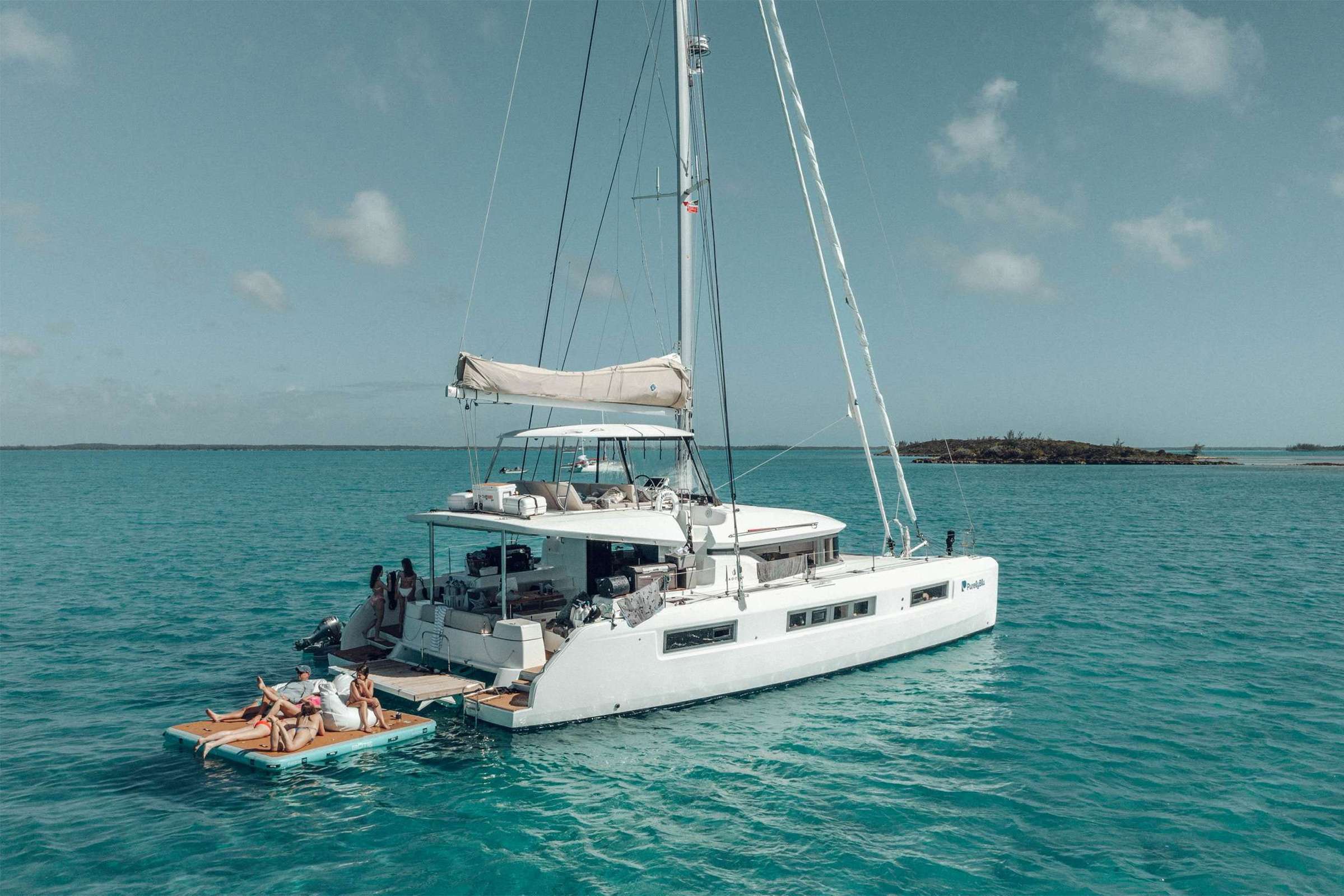 PurelyBlu Crewed Lagoon 50 Catamaran Charters Sailing the Bahamas.