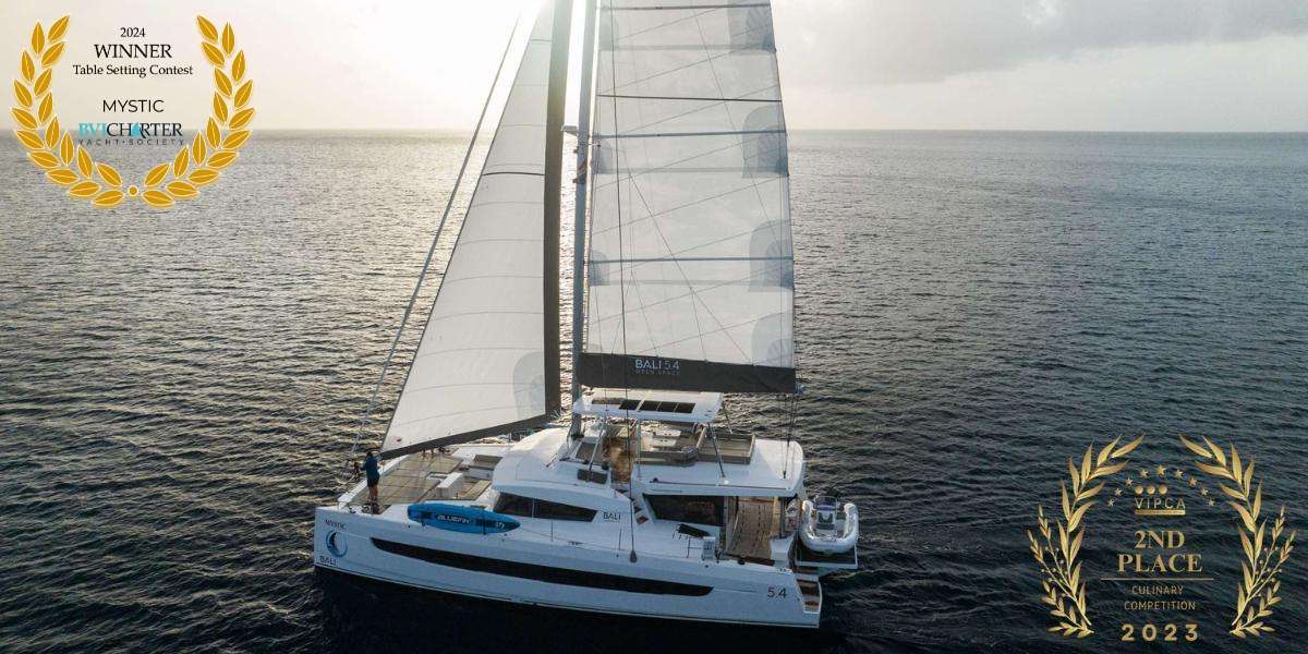 Mystic Crewed Bali 5.4 Catamaran Charter Sailing the BVI.