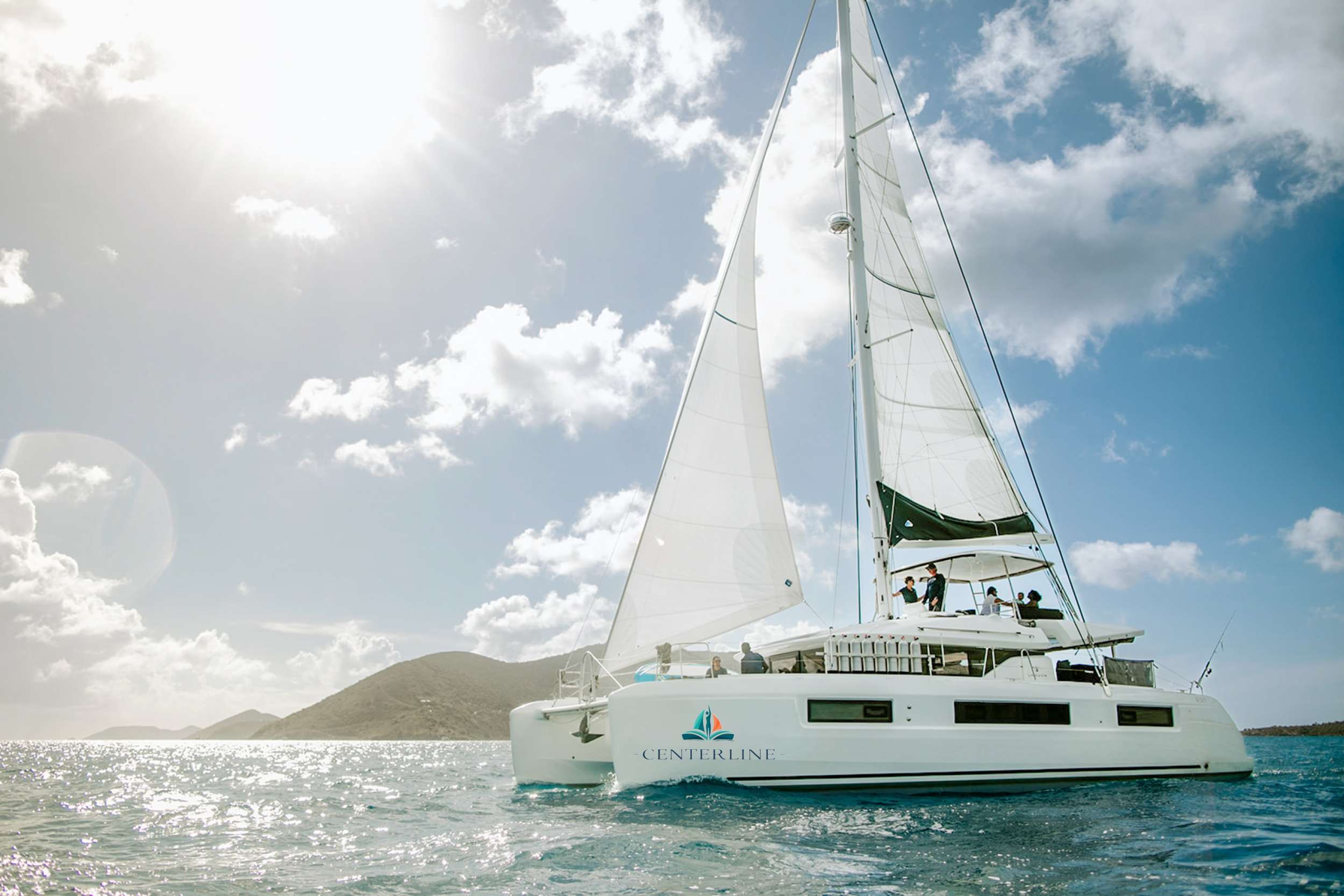 Centerline Crewed Lagoon 51 Catamaran Charters Sailing the BVI.